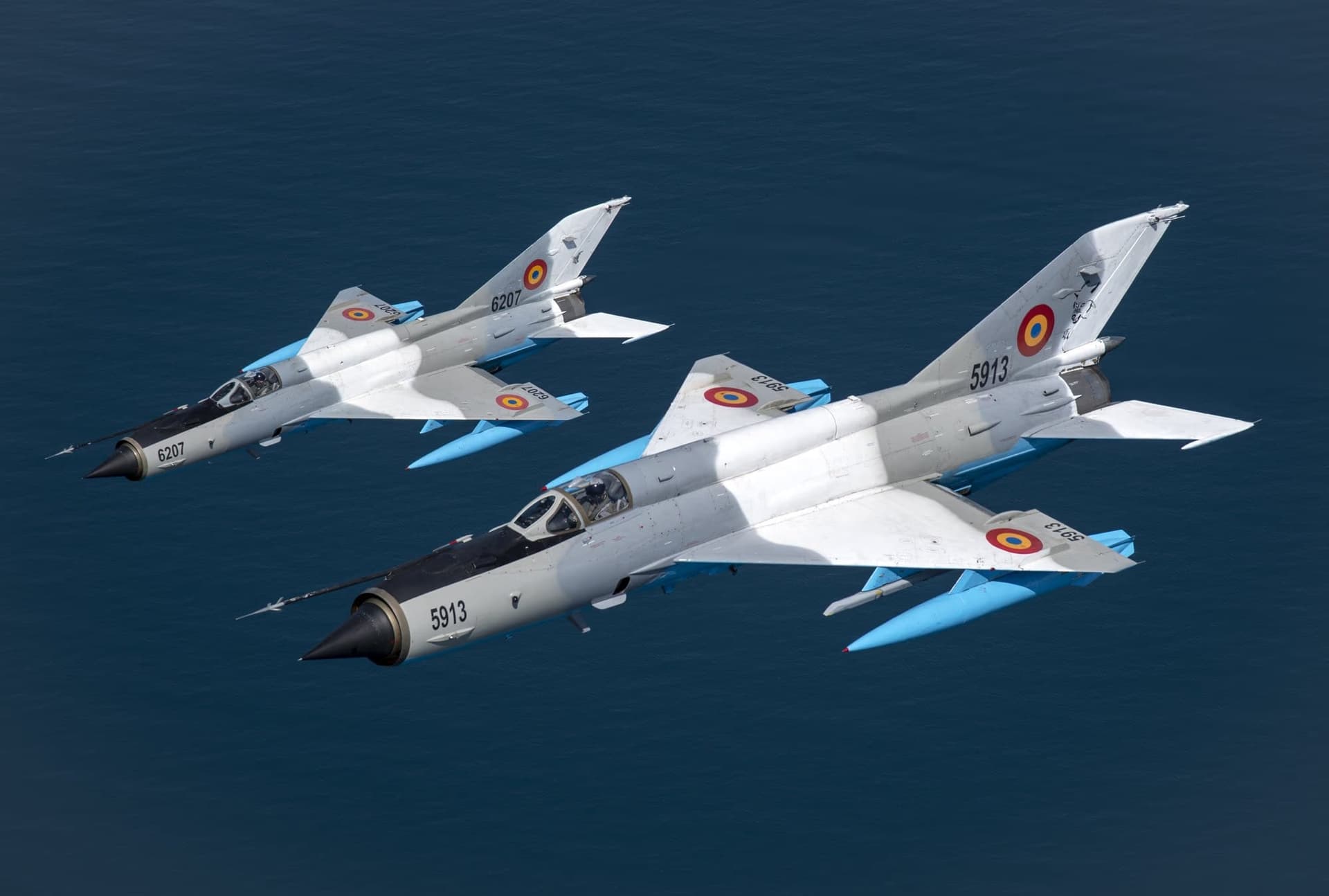 Two MiG-21 LanceRs above the Black Sea — aircraft 5913 and 6207 in tight formation