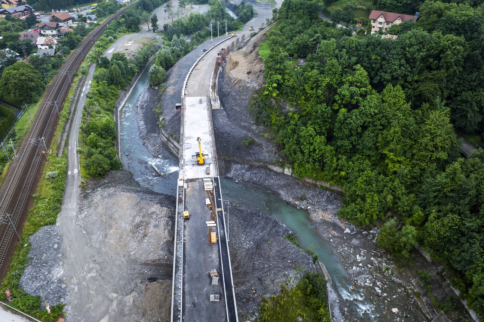 Comarnic Bypass bridge under construction, close view with a yellow crane on the deck
