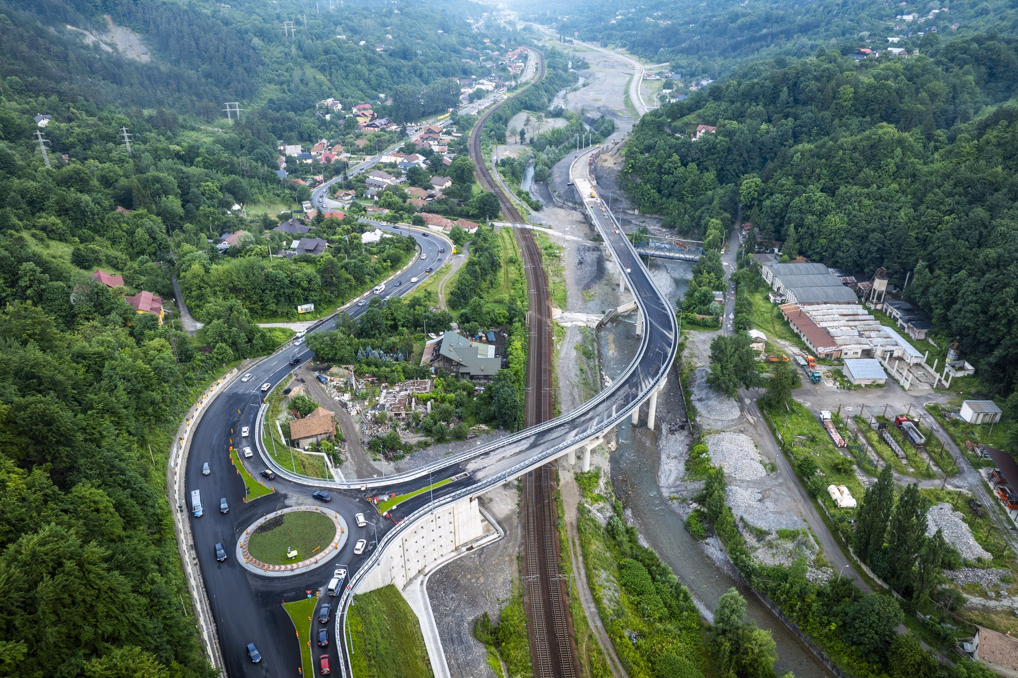 Comarnic Bypass panoramic view with bridge, roundabout and village in the background