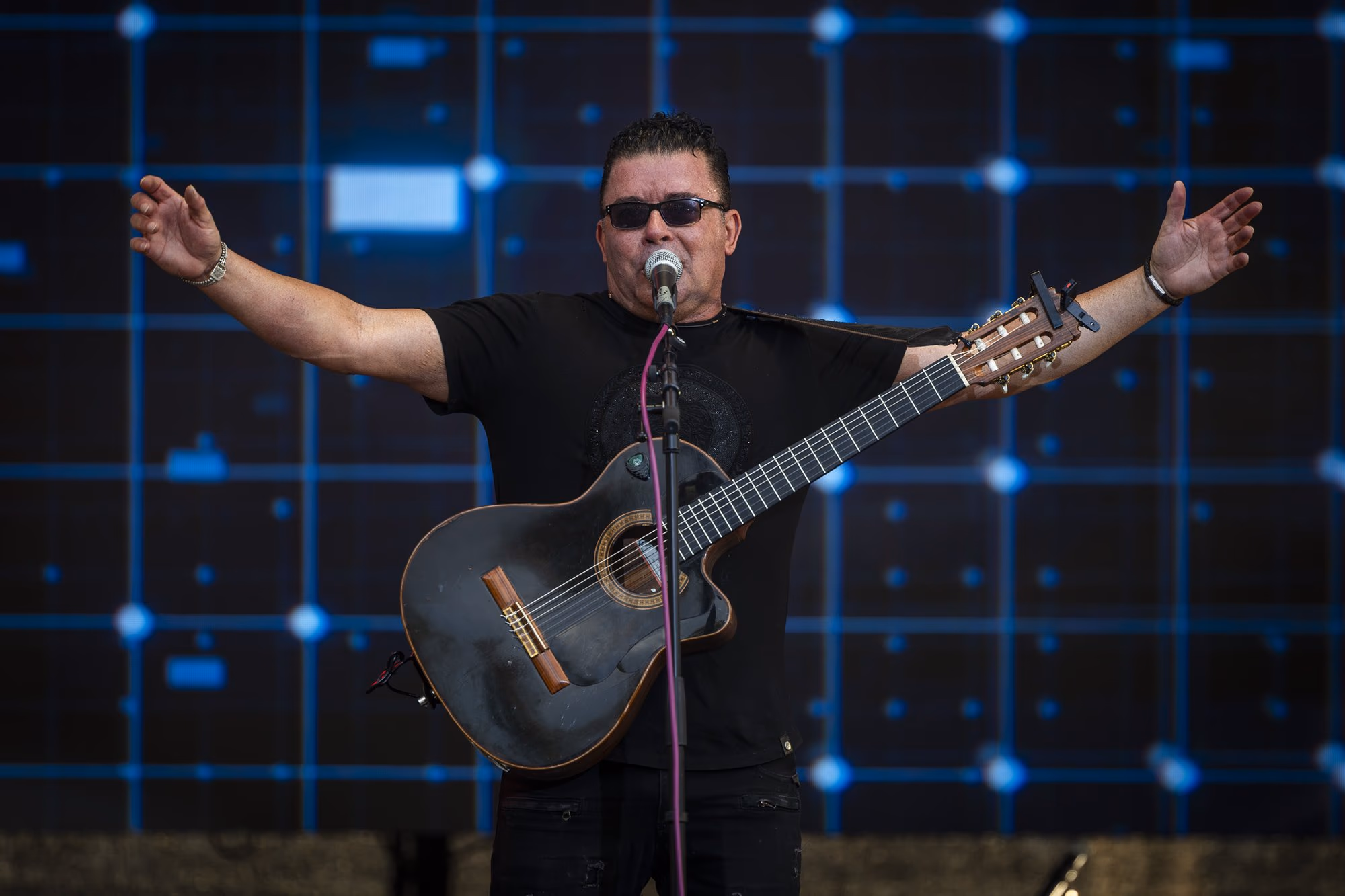Guitar solo — Marty Cintron on stage in Romania. Photo: AdiCoco.com