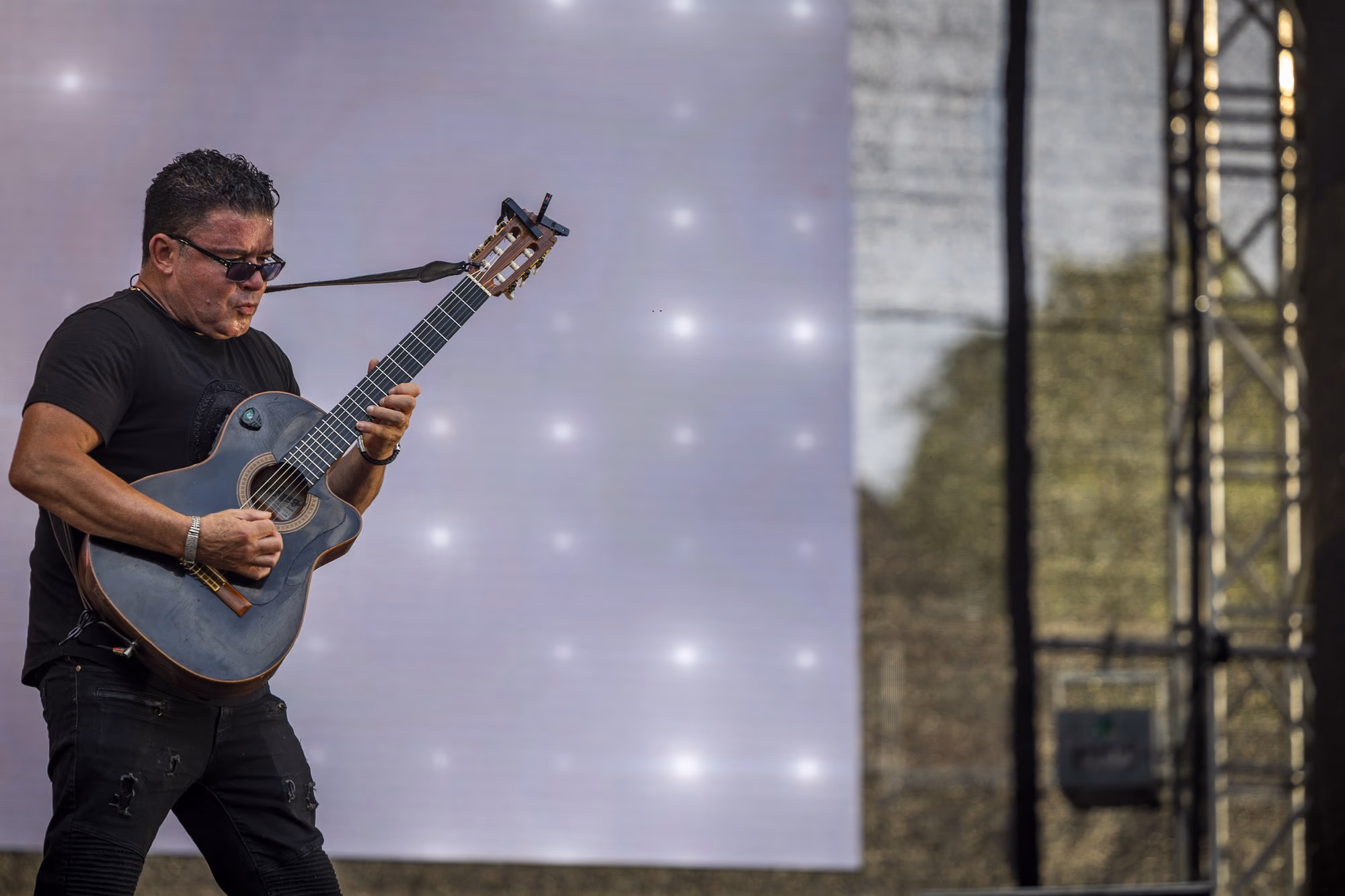 The guitar — the natural extension of Marty's hands. Photo: AdiCoco.com