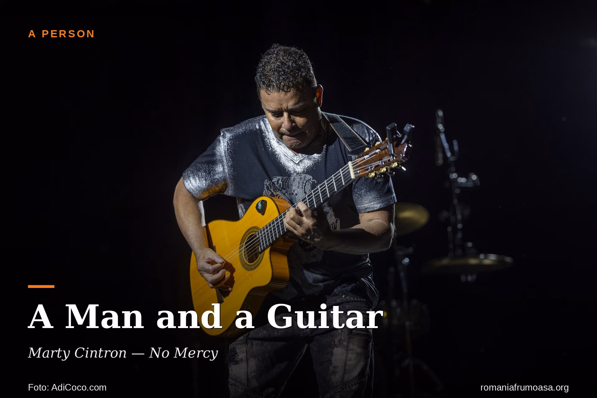 Marty Cintron, No Mercy, on stage — a man and a guitar. Photo: AdiCoco.com