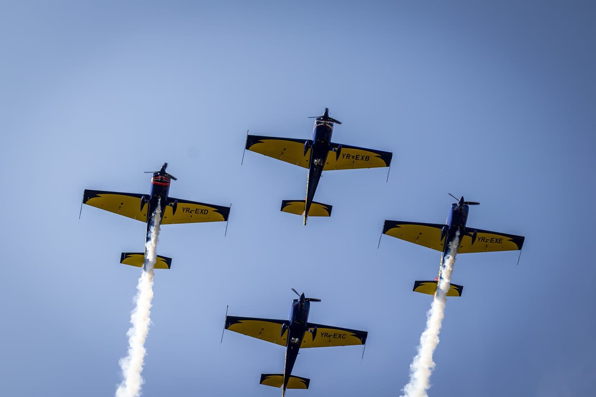 The Romanian Aeroclub's Extra 300s in formation. Photo: AdiCoco.com