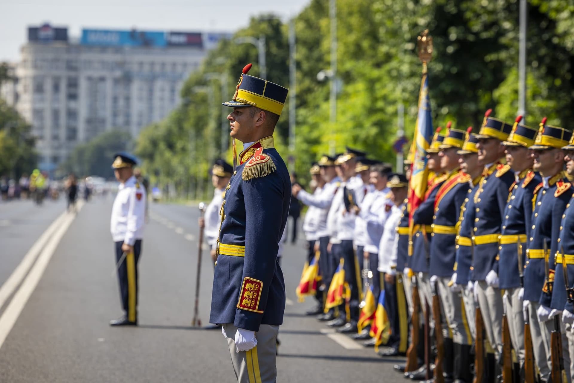 Soldiers lined up with flags at the ceremony. Photo: AdiCoco.com