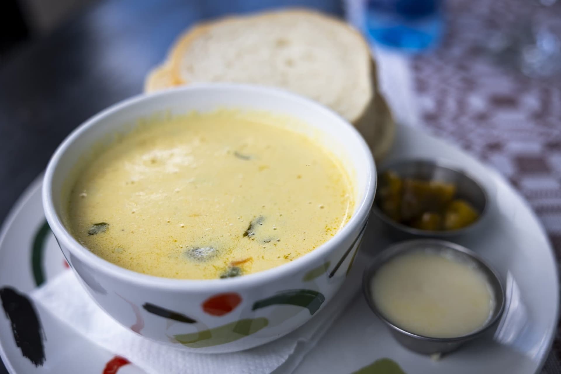Ciorba ciocăneșteană with bread and sour cream, at Gabimar Guesthouse