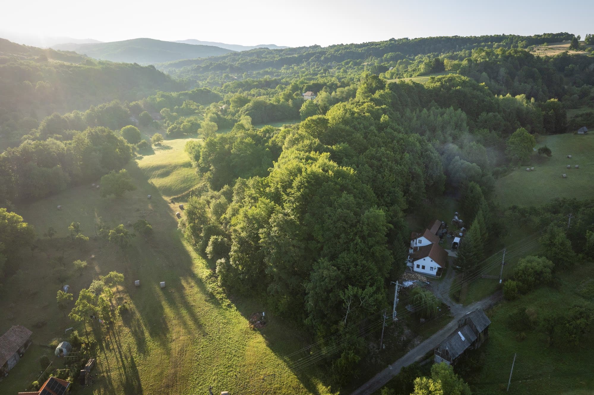 The village of Idicel-Pădure seen from a drone, in the light of sunrise