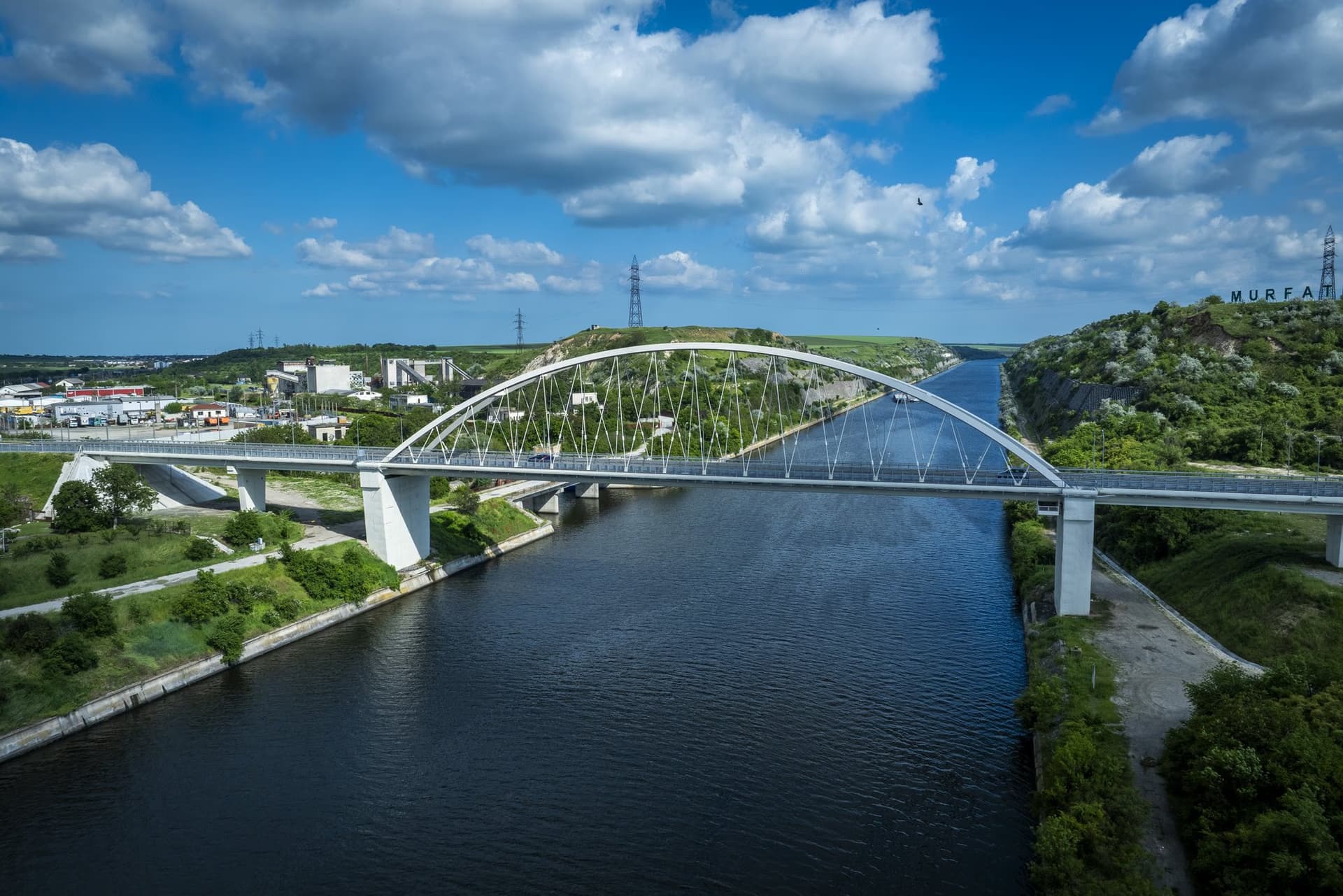 Looking east: the canal disappears between the cliffs, the bridge in the foreground
